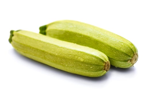 Fresh raw zucchini isolated on a white background