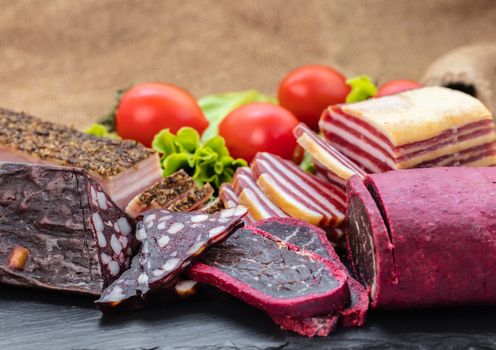 assorted meat of sausages and vegetables close-up