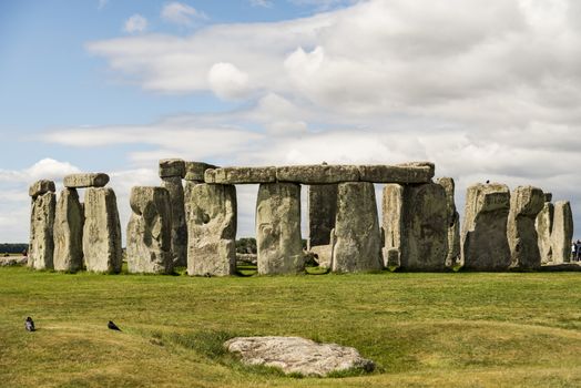 Stonehenge an ancient prehistoric stone monument near Salisbury, Wiltshire, UK. It was built anywhere from 3000 BC to 2000 BC. Stonehenge is a UNESCO World Heritage Site in England.