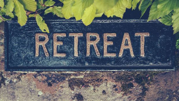 Retro Styled Image Of A Hidden Sign For A Spiritual Retreat