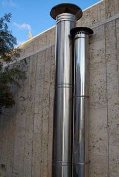 Ventilation system metal pipes of a small public building