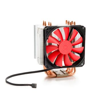 CPU cooler with fan and heat pipes isolated on white background