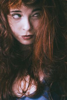 Close up portrait of a red-haired woman