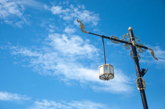 A street light, light pole, lamppost, street lamp, light standard, or lamp standard is a raised source oflight on the edge of a road or walkway. Modern lamps may also have light-sensitive photocells that activate automatically when light is or is not needed: dusk, dawn, or the onset of dark weather. This function in older lighting systems could have been performed with the aid of a solar dial. Many street light systems are being connected underground instead of wiring from one utility post to another.