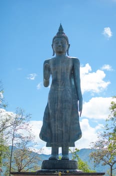 Buddha Leela The bronze statue of Buddha at the time of the King . With a height of 25 meters , the highest peak Tri enshrined . Measuring the analog Ram Tip drug treatment . San Pa Muang district , Muang . Phayao .
