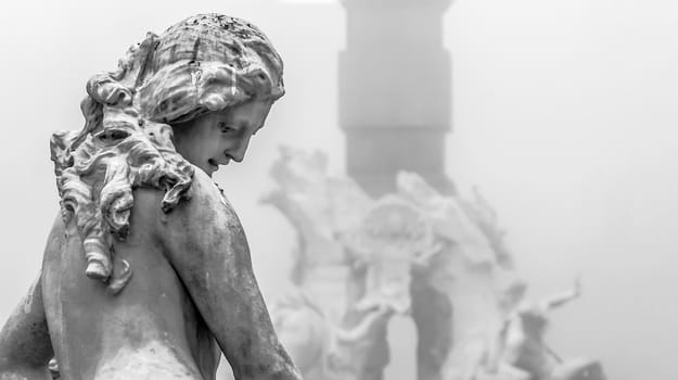 detail of a marble statue in Rome