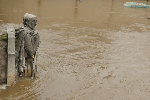 Zouave statue is most famous feature of Pont de Alma, Zouave statue shows how high Seine has risen.