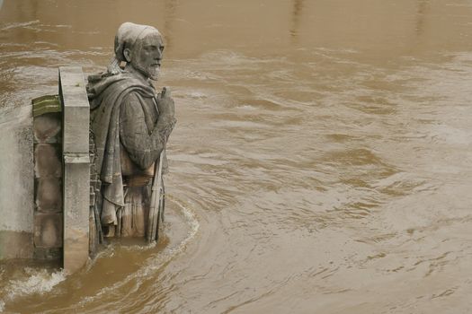 Zouave statue is most famous feature of Pont de Alma, Zouave statue shows how high Seine has risen.