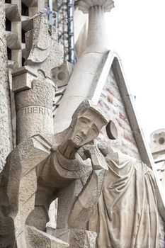 BARCELONA, SPAIN - MAY 13, 2016 : Details of Sagrada Familia, church  designed by Spanish architect Antoni Gaudi. Catholic church still built since March 1882, is a combination of Gothic style and curvilinear Art Nouveau forms.