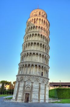 Pisa tower at Piazza del Duomo o dei Miracoli or Cathedral Square of Miracles by sunset, Italy, hdr