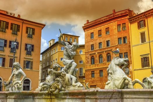 Fontana del Nettuno, fountain of Neptune, in colorful Piazza Navona, Roma, Italy