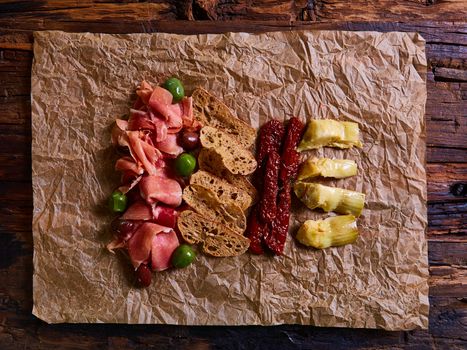 National Spanish tapas on a wooden background