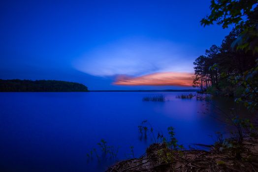 gorgeous sun setting at a local lake