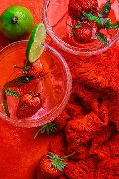 Martini glass with strawberries and red lace