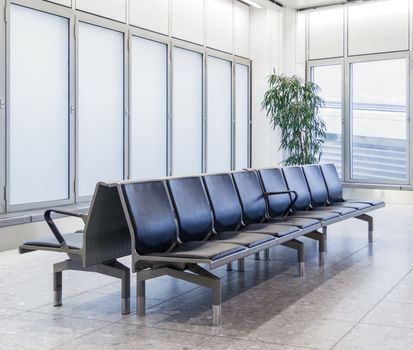 Seats in an empty airport lounge