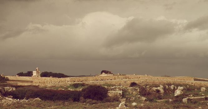 Castle Walls and Watchtower of La Mola Fortaleza Isabel II in Cloudy Day Outdoors, Menorca, Balearic Islands. Retro Styled 
