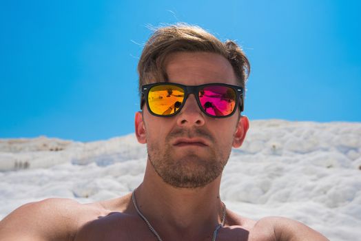 Selfie of man in Pammukale near modern Turkey city Denizli, Turkey