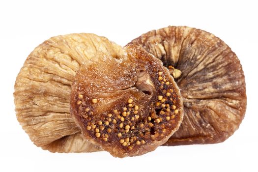 some fruits of dried fig isolated on white background.