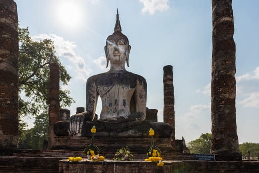 Wat mahatat, Sukhothai Historical park, Thailand.  Beautiful statue of Buddha smiling