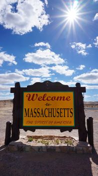 Welcome to Massachusetts road sign with blue sky