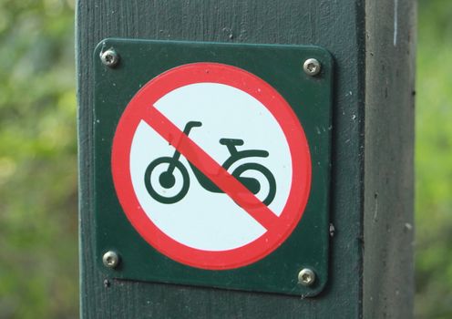 Sign in forest prohibits moped riding