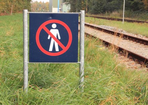 Sign prohibits access to a railway area