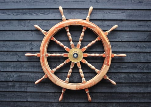 Old trawler steering wheel made of hardwood