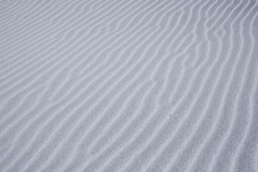 Isolated vertical  sandy wave texture at beach