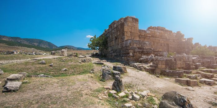 Pammukale, Turkey - July, 2015: photo of ancient city Hierapolis, near modern turkey city Denizli
