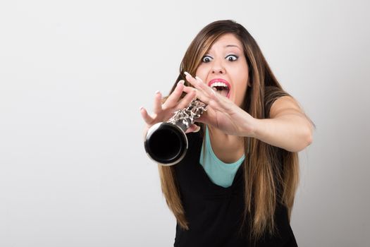 Funny woman with her clarinet