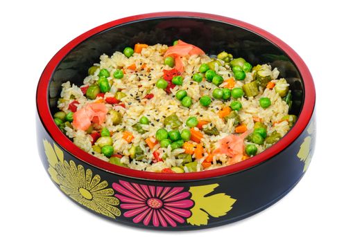 Risotto with rice, green peas, carrot, bell pepper, pickled cucumbers in black bowl isolated on white background