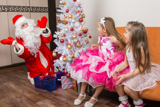 Two girls ambush for Santa Claus