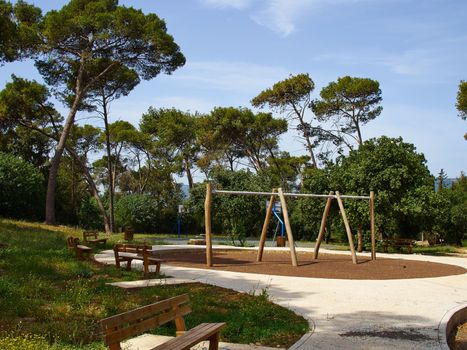 Creative modern playground made of wood in the middle of nature     