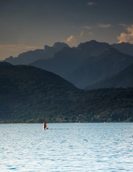 Romantic sunset on a lake in North Italy during summer vacation