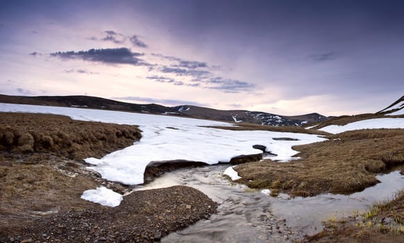 Beauty of Northern nature. Mountain river in spring landscape