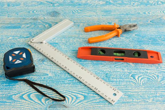 The photo shows the instruments on a blue background