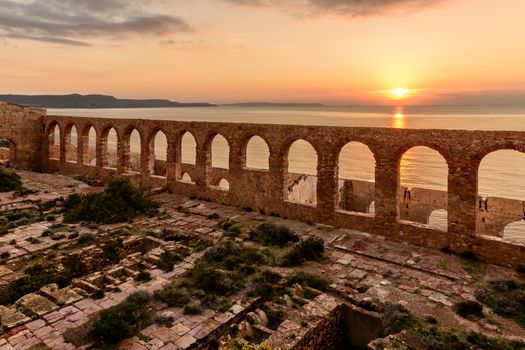 Ruins of industrial mining along the west coast of Sardinia. Panorama at sunset. The Marmora washery.