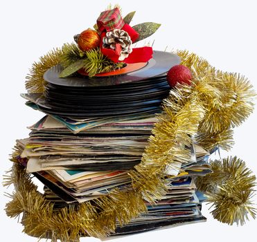Christmas still life with a vinyl disc and balls Christmas tree decorations on a white background.