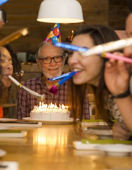 Big family celebrate the birthday of the grandfather