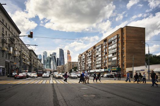 Moscow, Russia - June 10, 2016: busy street in Moscow, on the background Moscow International Business Center