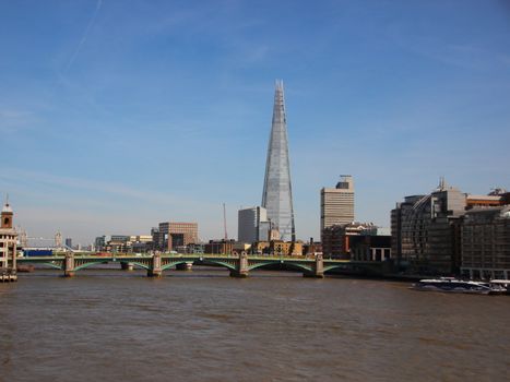 River Thames with The Shard Tower in Blue Sky Background