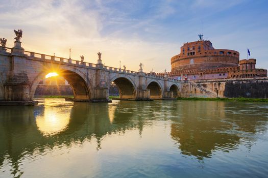 Rome. Image of the Castle of Holy Angel and Holy Angel Bridge over the Tiber River in Rome at sunset.