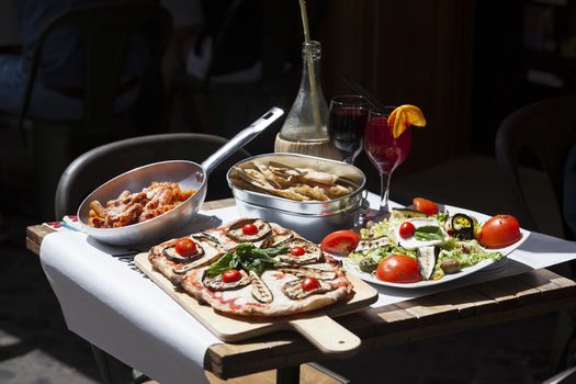 traditional italian food in outdoor restaurant