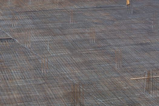 Foundation building of steel and concrete for the construction of an apartment building with underground parking.