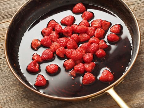 close up of rustic french raspberry fruit compote preserve