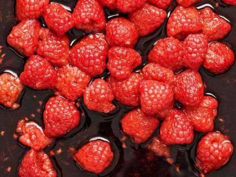 close up of rustic french raspberry fruit compote preserve