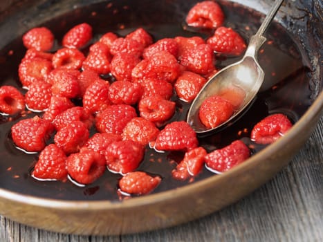 close up of rustic french raspberry fruit compote preserve