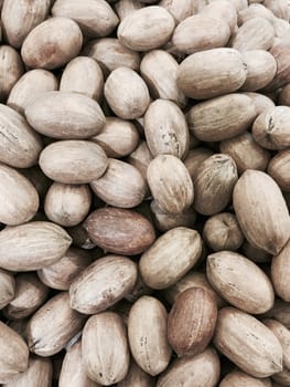 Pecan nuts in a market, healthy snack.