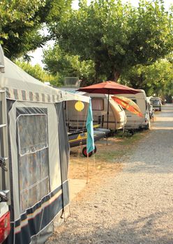 Caravans with tent on Italian camping ground