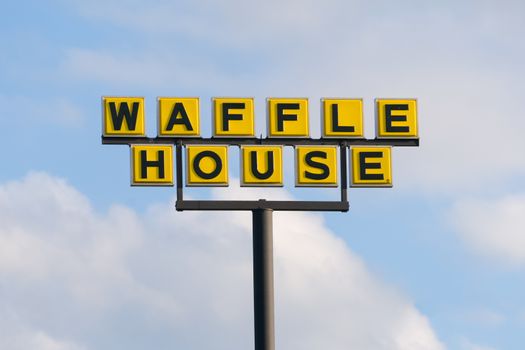 MOORE, OK/USA - MAY 20, 2016: Waffle House exterior sign and logo. Waffle House, Inc., is a restaurant chain with more than 2,100 locations in 25 states in the United States.